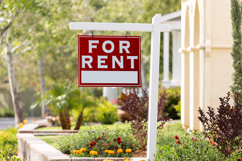  a for rent sign in a front yard